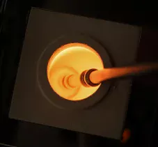 Glowing Loggerhead iron used to heat a cocktail