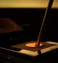 Red-hot Loggerhead iron lowered into a cocktail